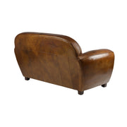 Club Paquebot bőrkanapé hátsó és oldalsó nézetből, kompakt, ívelt kialakítással