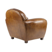 Háromnegyedes nézet hátulról, ahol látható a Club Paquebot fotel ívelt hátsó vonalvezetése és sima bőrfelülete.