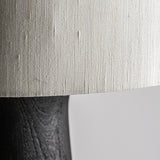 Mangófából faragott, fekete színű design állólámpa, krém színű juta lámpaernyővel.