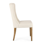 Krémszínű buklészövettel kárpitozott, tölgyfából készült szék.