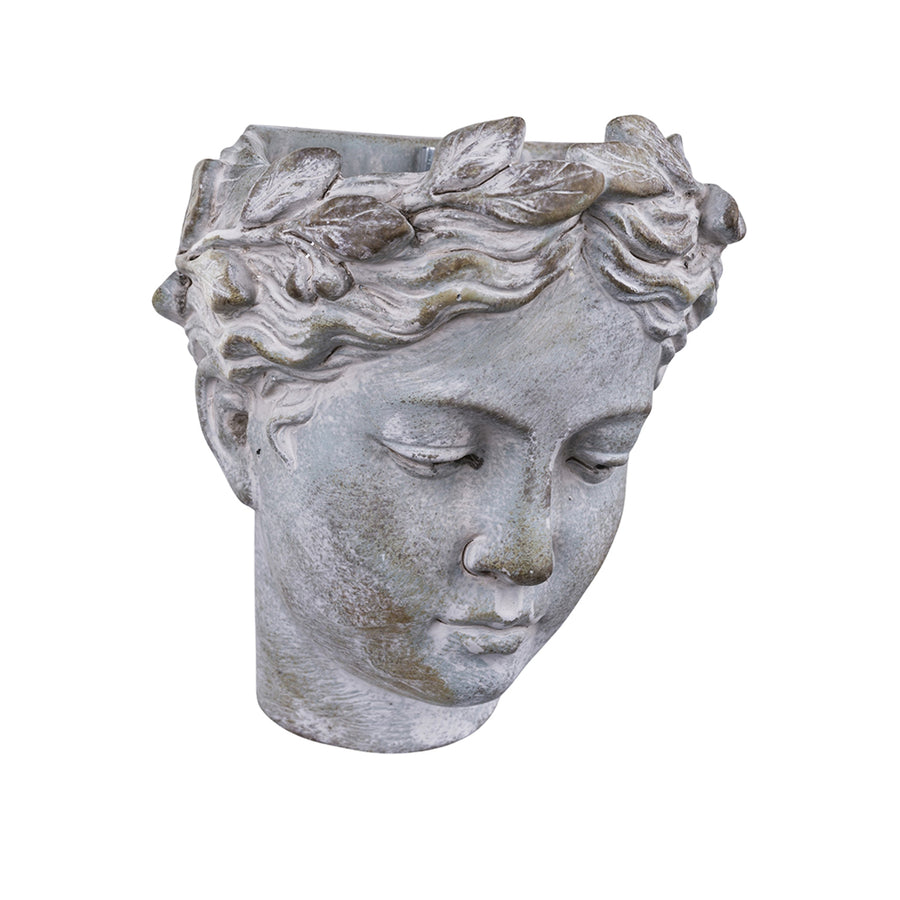 Szürke színű, falra helyezhető női kaspó büszt.