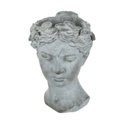 Női mellszobor formájú,antikolt felületű, szürke színű, kaspó büszt.