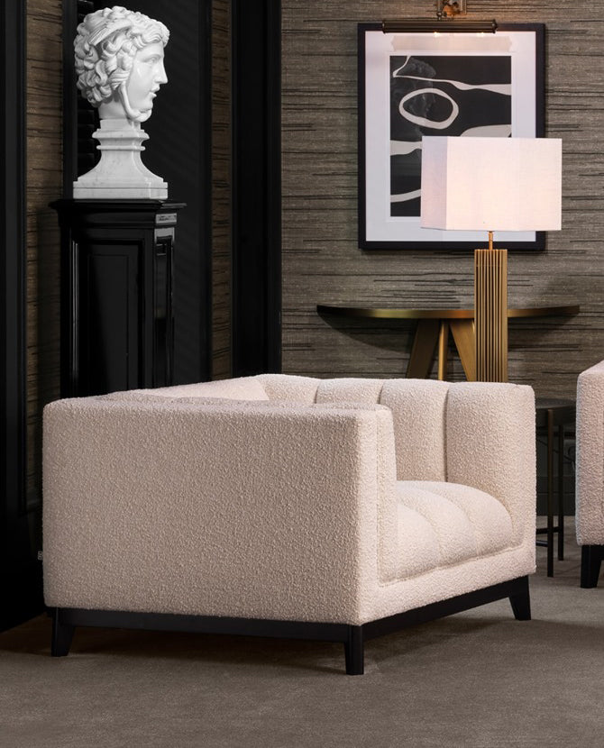Krémszínű buklé szövettel kárpitozott, prémium minőségű, formatervezett design fotel.