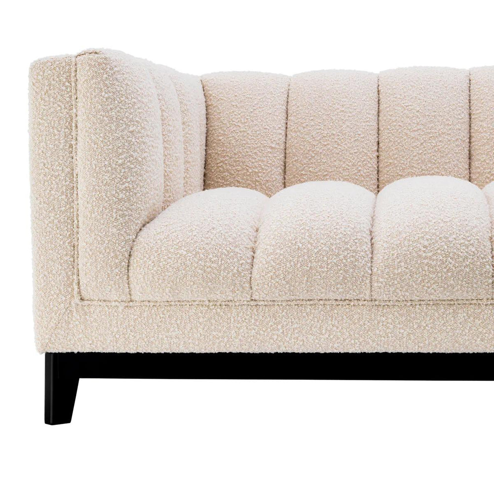 Krémszínű buklé szövettel kárpitozott, prémium minőségű, formatervezett design kanapé,