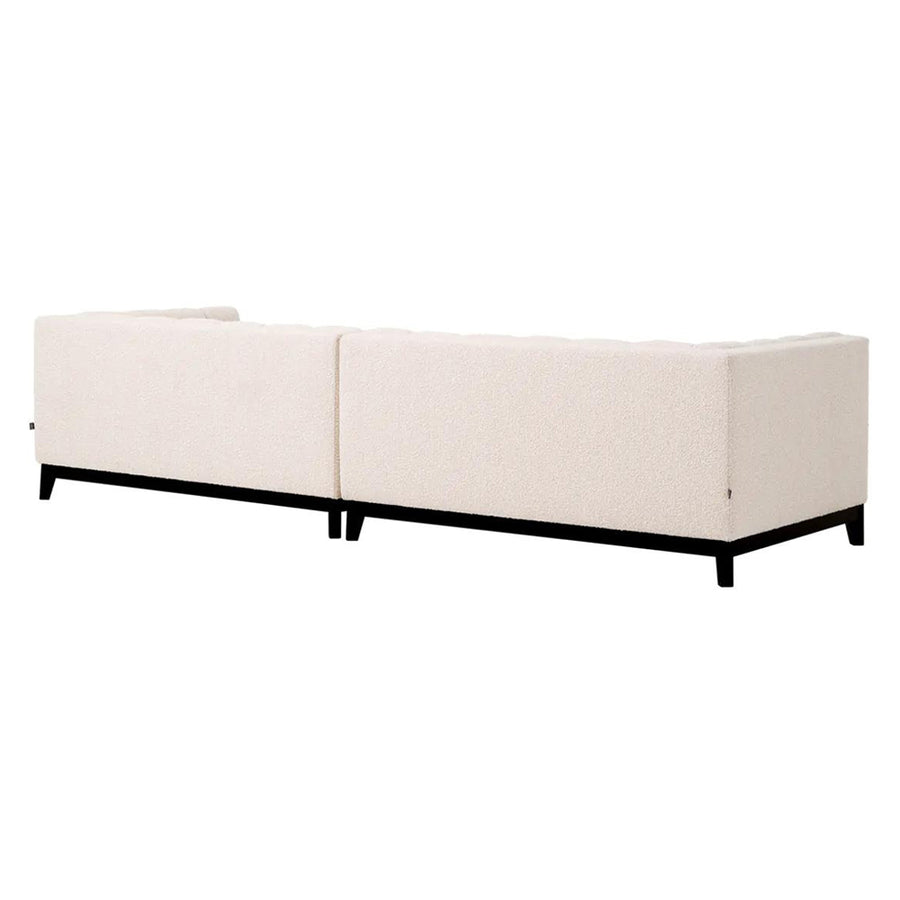 Krémszínű buklé szövettel kárpitozott, prémium minőségű, formatervezett design kanapé.