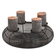 Fekete színű, adventi gyertyatartó.