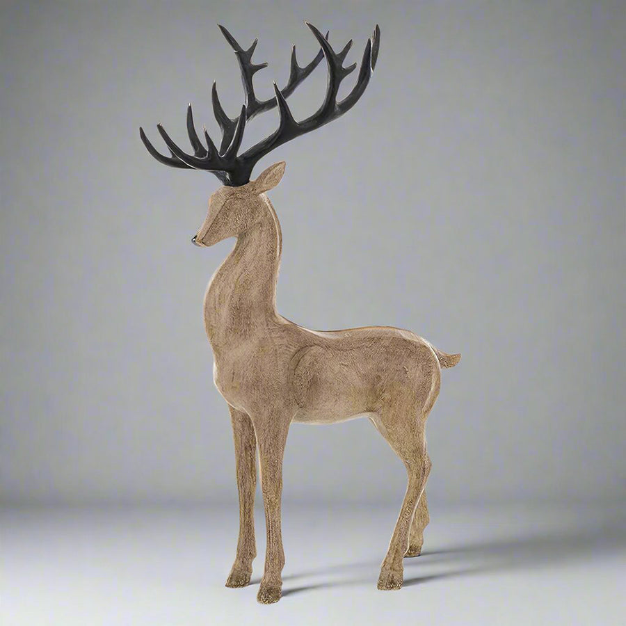 Natúr színű, karácsonyi szarvas figura.