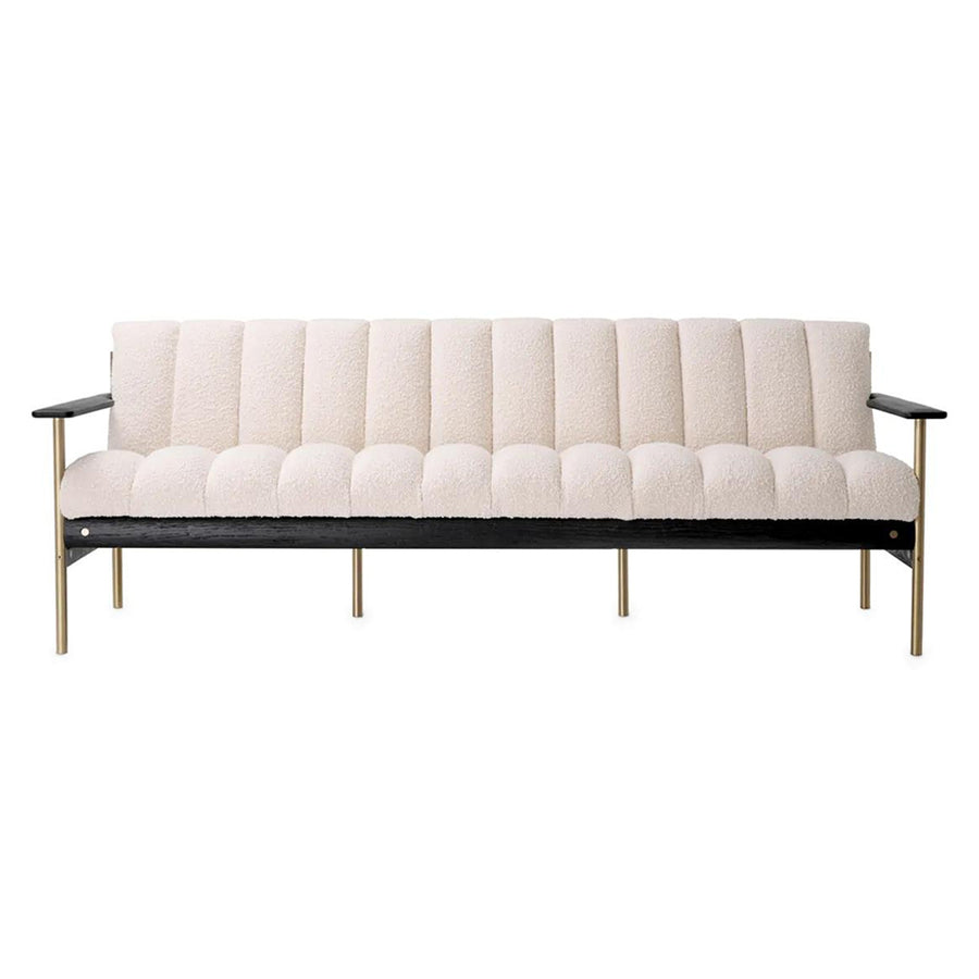 Krémszínű buklé szövettel kárpitozott, prémium minőségű, formatervezett design kanapé.