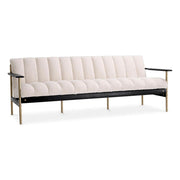 Krémszínű buklé szövettel kárpitozott, prémium minőségű, formatervezett design kanapé.