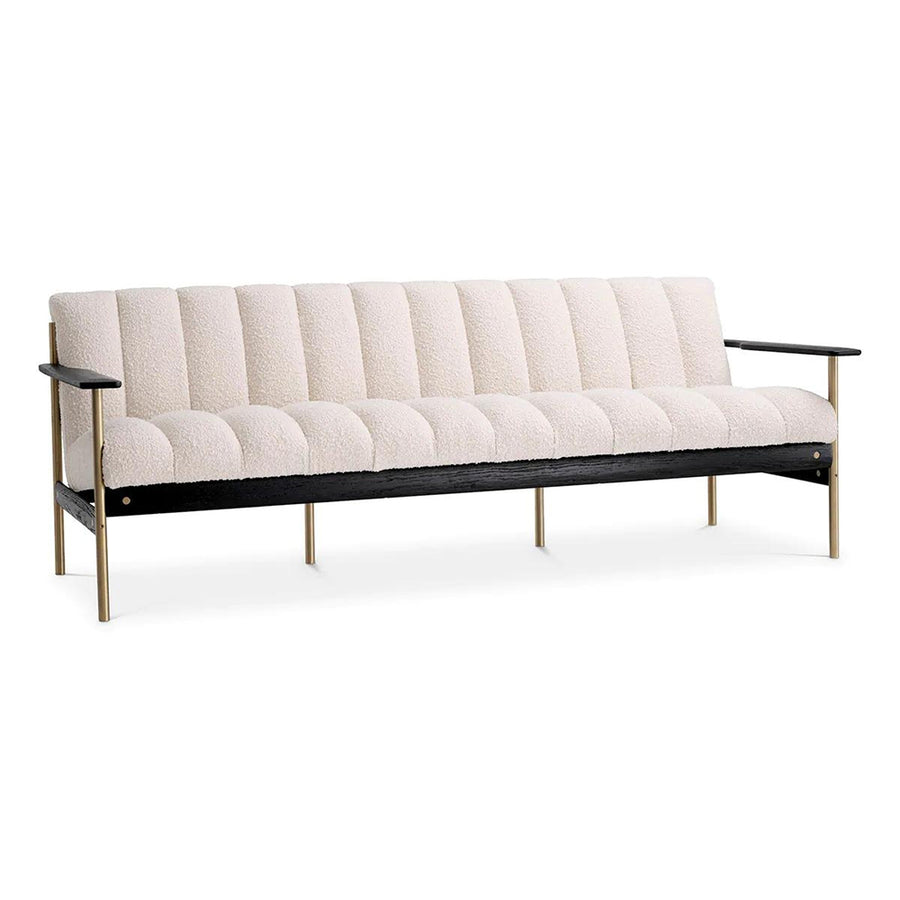 Krémszínű buklé szövettel kárpitozott, prémium minőségű, formatervezett design kanapé.