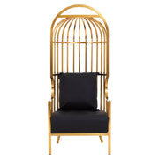 Aranyszínű, kalitka formájú design fotel.