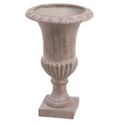 England antik homokszínű kaspó növénnyel berendezve, elegáns beltéri enteriőrben