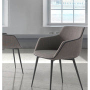 Szürke színű szövettel kárpitozott, acél szerkezetű, formatervezett dizájn étkezőszék.