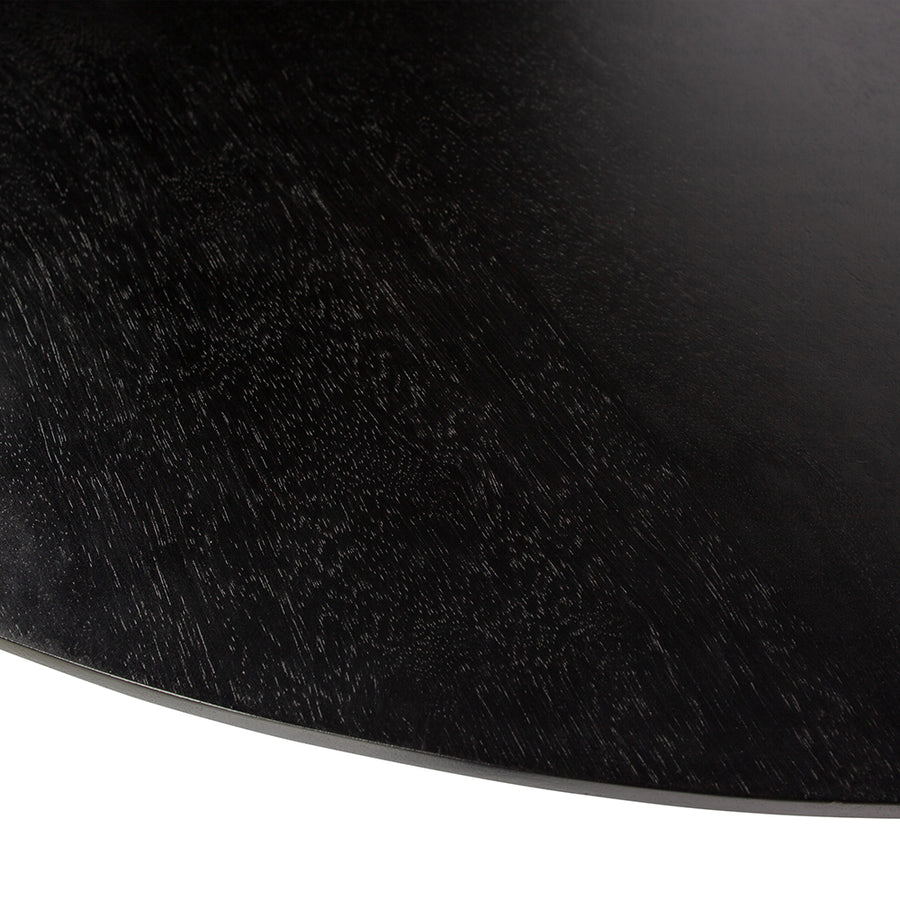 Kerek formájú, mélyfekete színű, dizájn étkezőasztal.