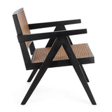 Fekete színű, teakfából és rattanból készült, formatervezett design fotel.