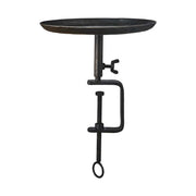 Fekete színű, vasból készült, kézműves gyertyatartó.