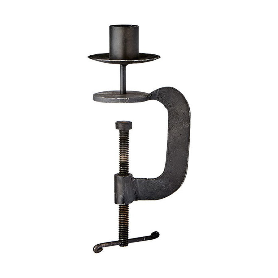 Kovácsoltvasból készült, kézműves gyertyatartó.