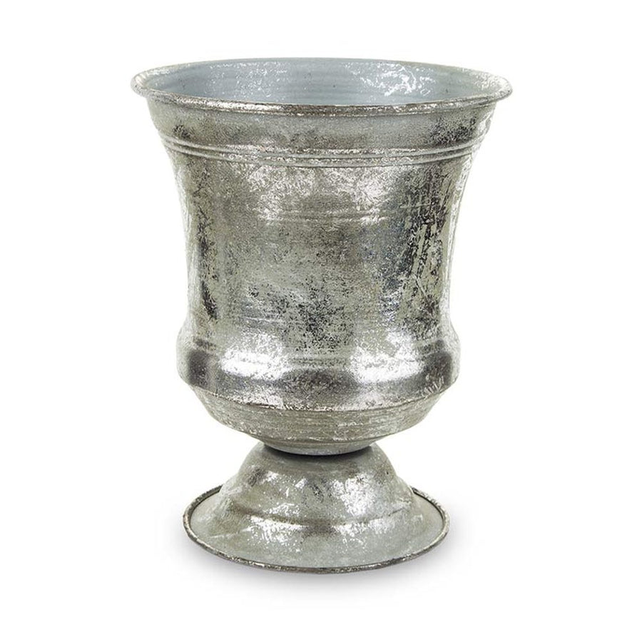 Ezüst színű fém kaspó.