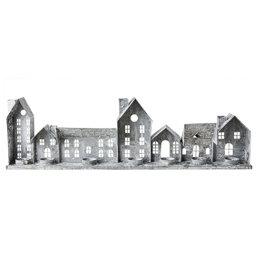 Szürke színű, bádogból készült házikókat formázó lámpás.