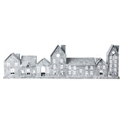 Szürke színű, bádogból készült házikókat formázó lámpás.