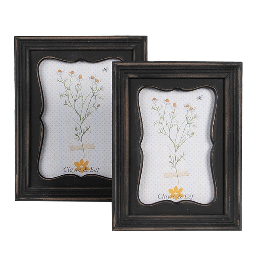 Sötétbarna színű fából készült, asztali-fali fényképtartó képkeret.