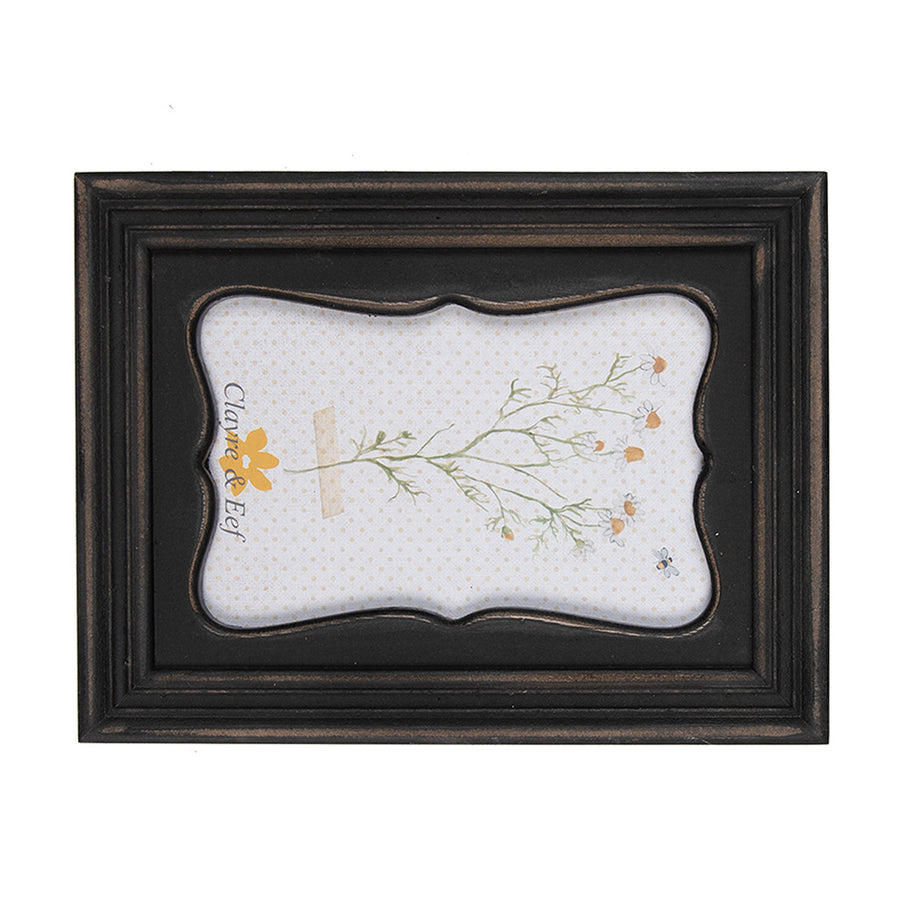 Sötétbarna színű fából készült, asztali-fali fényképtartó képkeret.