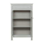 Szürke színű, zárható kialakítású, kétszárnyas fenyőfa komód.