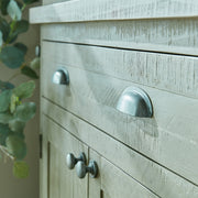 Tömör fenyőfából készült, mosott szürke színű, pácolt tálalószekrény.