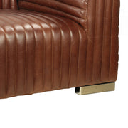 Georgio bőrkanapé krómozott fémláb részlet, minőségi bőrkárpit