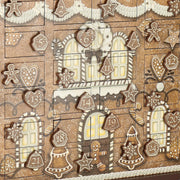 GINGERBREAD adventi naptár részlete, számozott ajtókkal és díszített ablakokkal