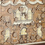 GINGERBREAD adventi naptár részlete, számozott ajtókkal és díszített ablakokkal