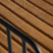 Közelkép a csatornavarrásos bőr ülőfelületről – természetes textúra.