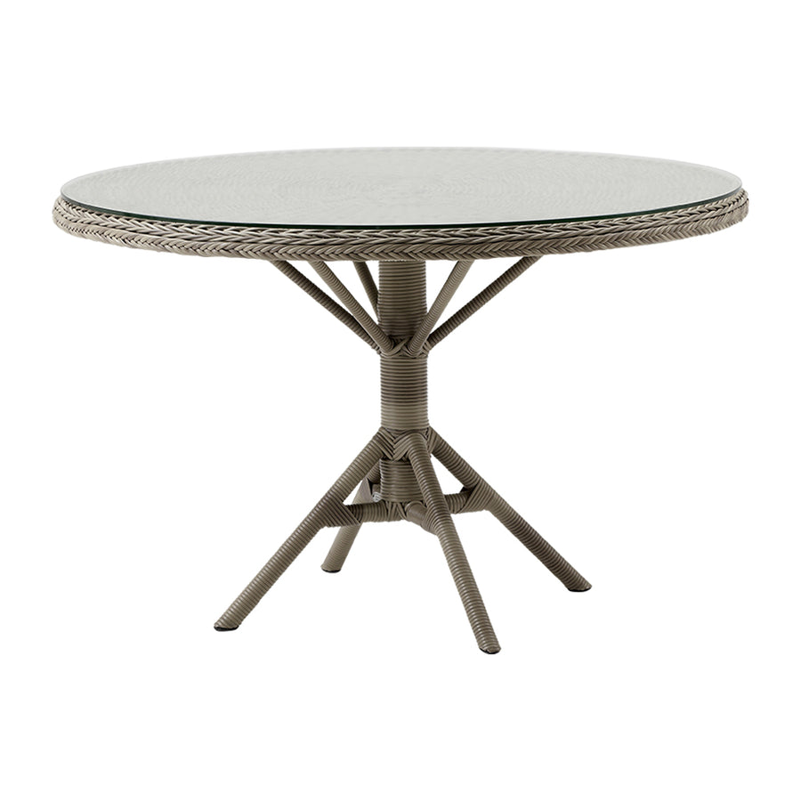 Üveglappal fedett, antikszürke színű, műrattan kerti asztal.