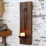 GRIMAUD rusztikus fali gyertyatartó falra rögzítve, égő gyertyával, loft hangulatban