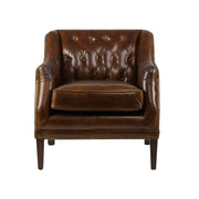 Vintage stílusú bőrfotel szemből, klasszikus gombbehúzásos háttámlával és bronzszínű szegecseléssel