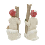 Heritage karácsonyi síléces gyerek figurák hátulnézetből, havas felületű részletekkel