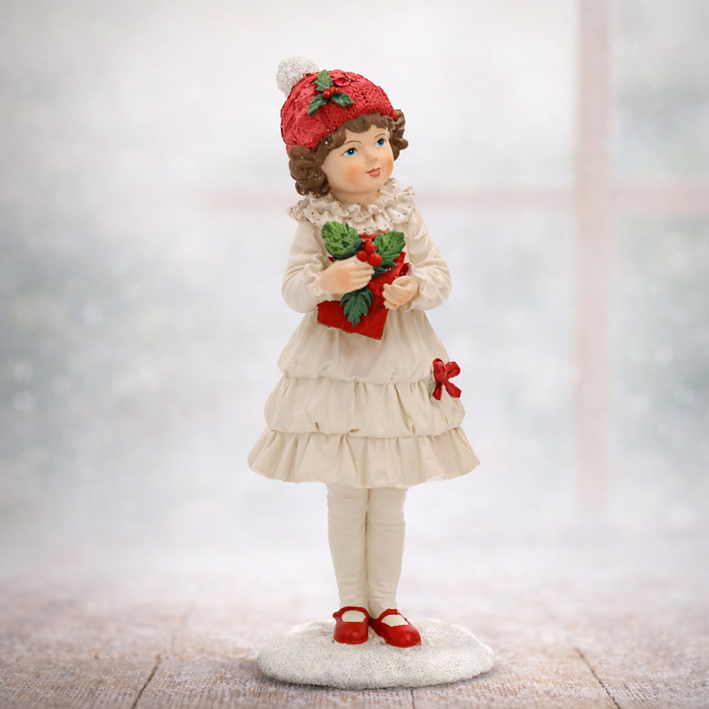 Heritage karácsonyi téli kislány figura világos, ünnepi hangulatképben