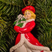 Klasszikus karácsonyi korcsolyázó figura részletgazdag kidolgozással