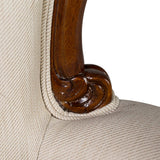 Klasszikus fotel fa keret és kárpit találkozásának részlete