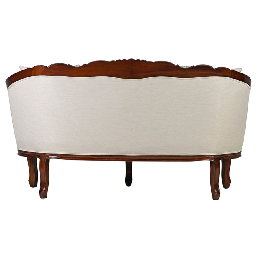 Hátulnézetből a bézs kárpitozás és a mahagónifa keret.