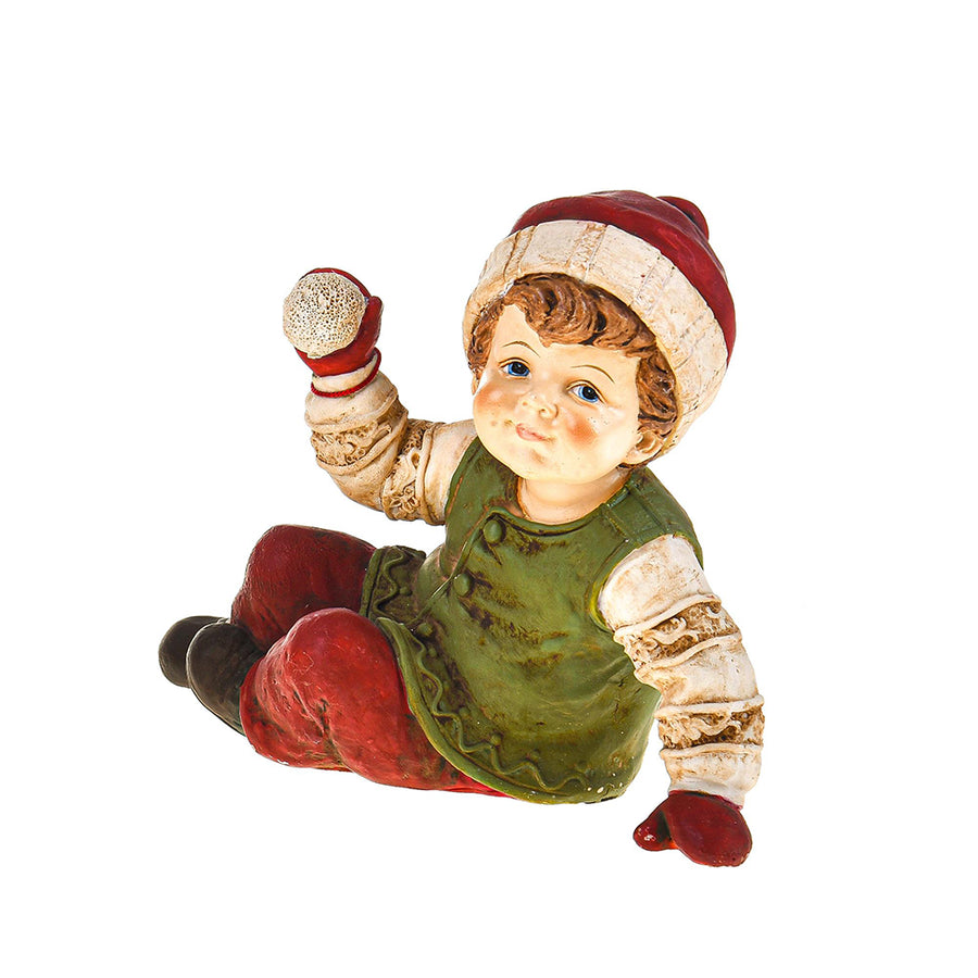 HERITAGE karácsonyi téli kisfiú figura hógolyóval, vintage stílusban, zöld mellénnyel és piros nadrággal.