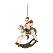 Kisfiú hintalóval akasztós karácsonyfadísz.