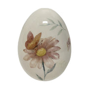 Pillangóval és virággal díszíttetett, húsvéti kerámia tojás.