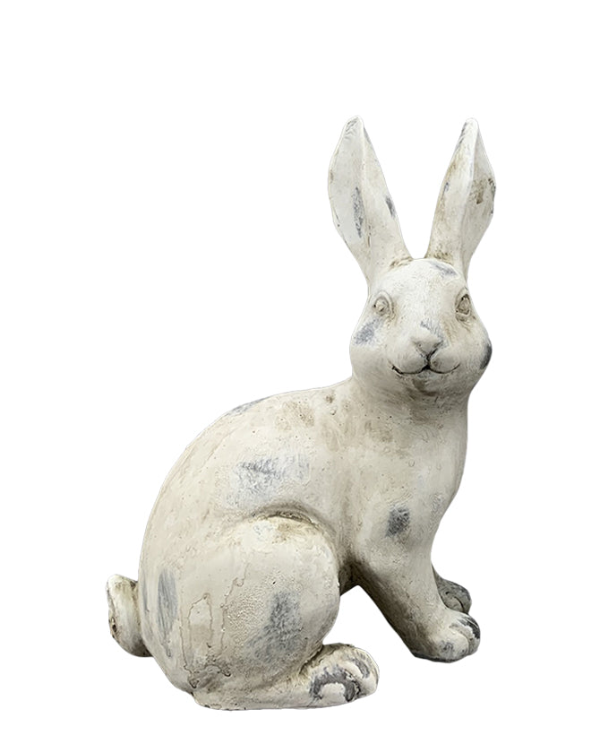 Antikolt felületű, krémszínű húsvéti nyuszi figura.