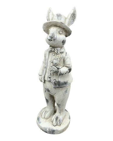 Antikolt felületű, krémszínű húsvéti nyuszifiú figura.