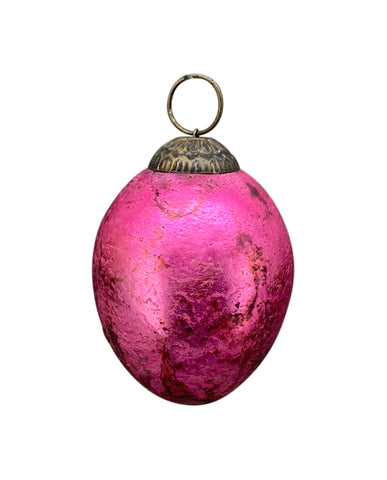 Függeszthető kialalkítású, pink színű húsvéti üvegtojás.