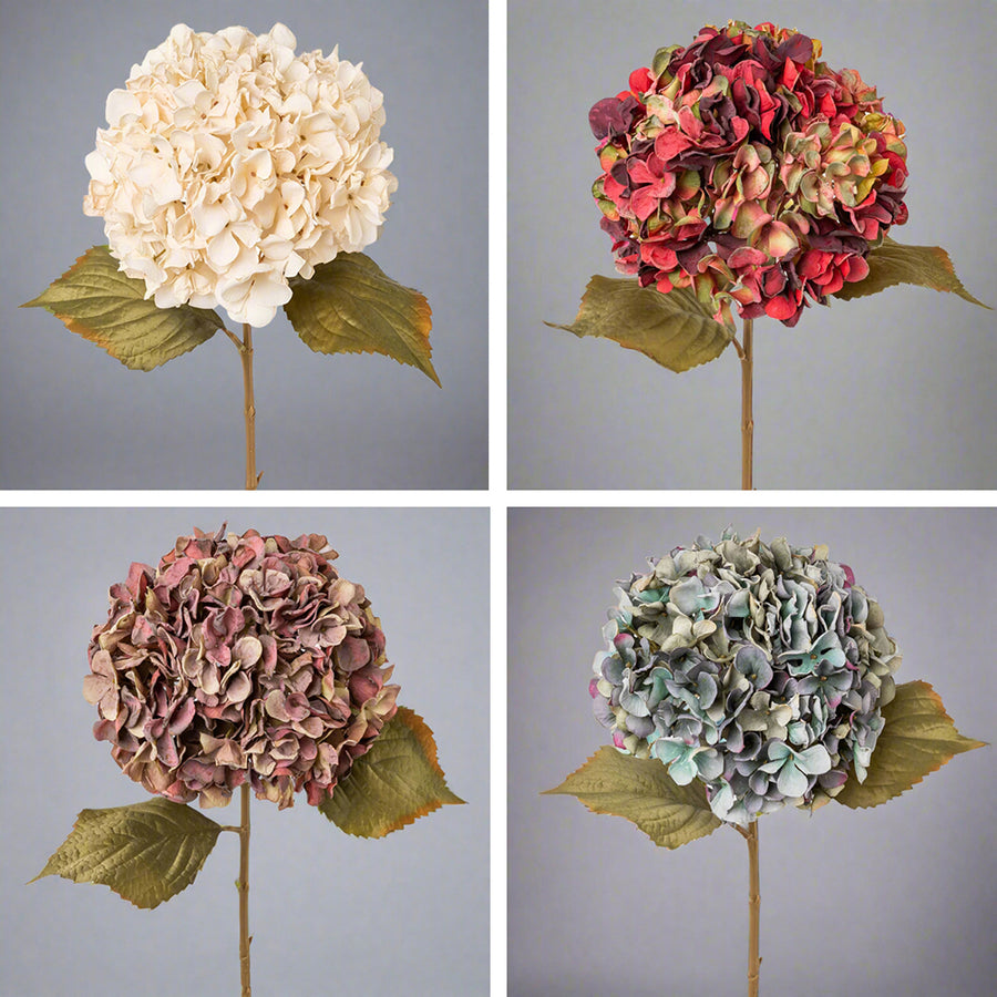 Négyféle színű, élethű Hydrangea mű hortenzia ág: fáradtbézs, fáradtkorall, fáradtmályva és fáradtkék árnyalatban, vintage stílusban, szürke háttér előtt.
