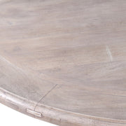 Natúrszínű, tömör akácfából készült, kerek formájú, exkluzív kézműves étkezőasztal.