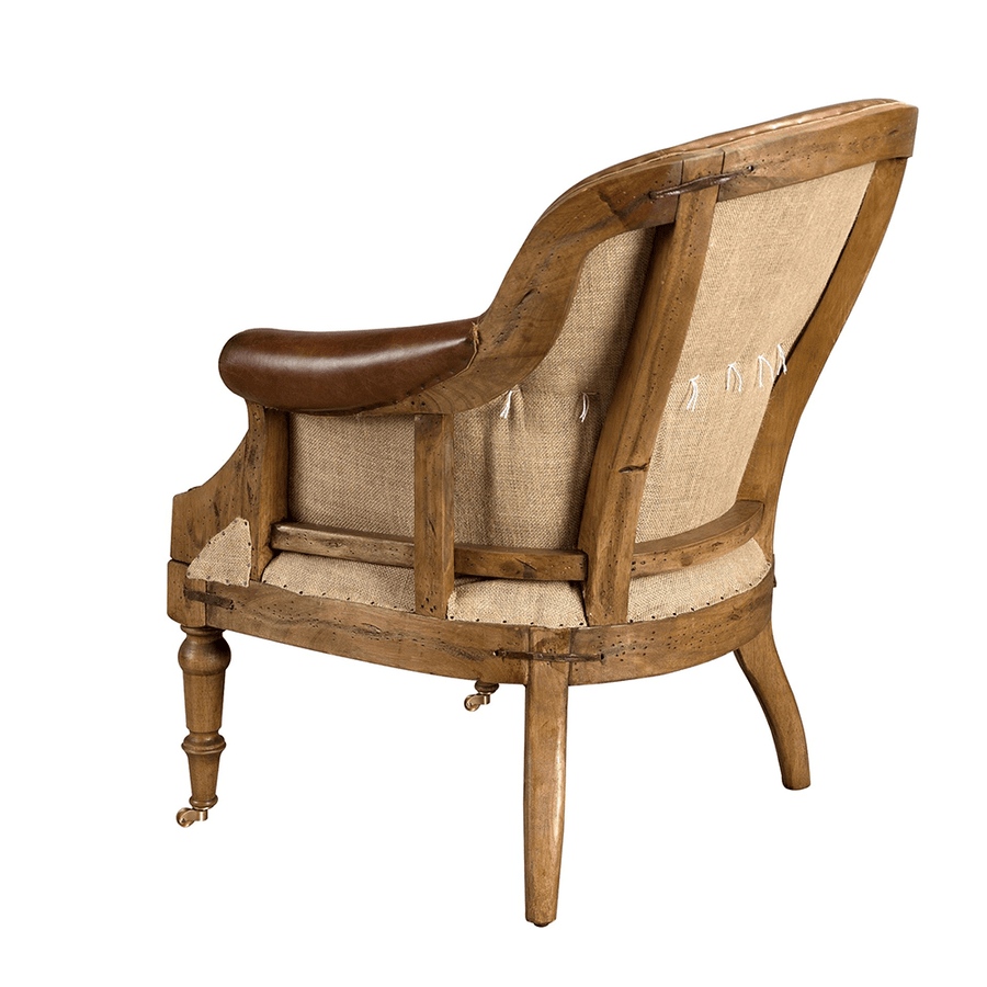 Konyakbarna színű cserzett marhabőrrel kárpitozott desing fotel.