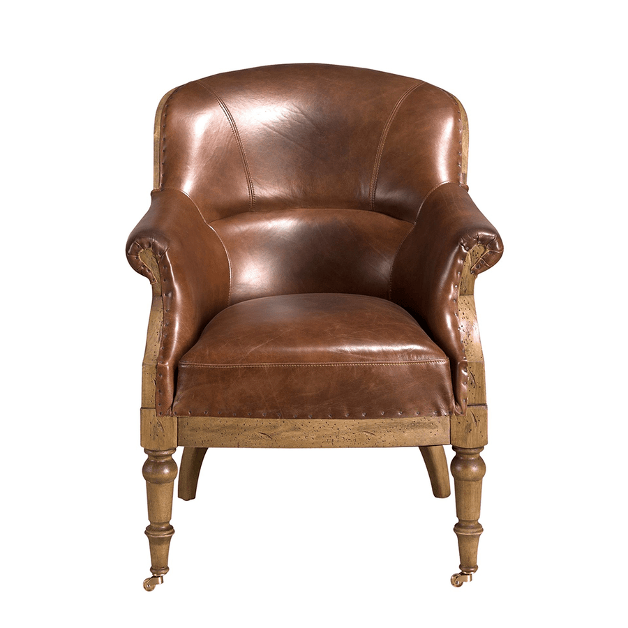 Konyakbarna színű cserzett marhabőrrel kárpitozott desing fotel.